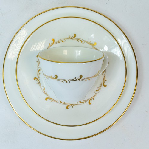 372 - Royal Doulton 'Rondo', gilt design on crisp white China, part tea/dinner set to include:- tea pot, e... 