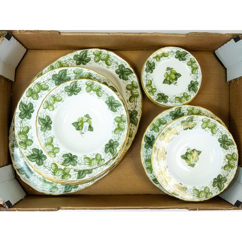 374 - Royal Worcester ' Hop' green on white design to include:- large serving platter, eight dinner plates... 
