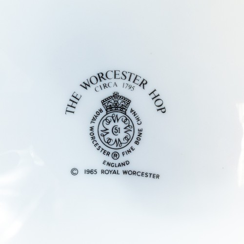 374 - Royal Worcester ' Hop' green on white design to include:- large serving platter, eight dinner plates... 