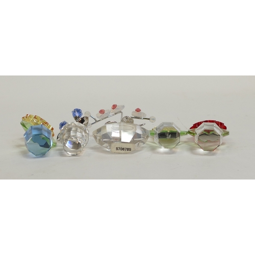 143 - Swarovski Crystal Flowers to include:- Sunflower (663148), Aster (681737), Forget Me Nots (626873), ... 