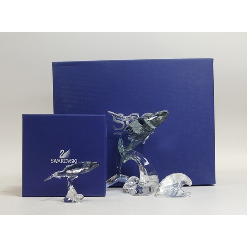 148 - Swarovski Paikea Humpbacked Whale with Wave Plaque (1095228) together with Young humpbacked Whale (1... 