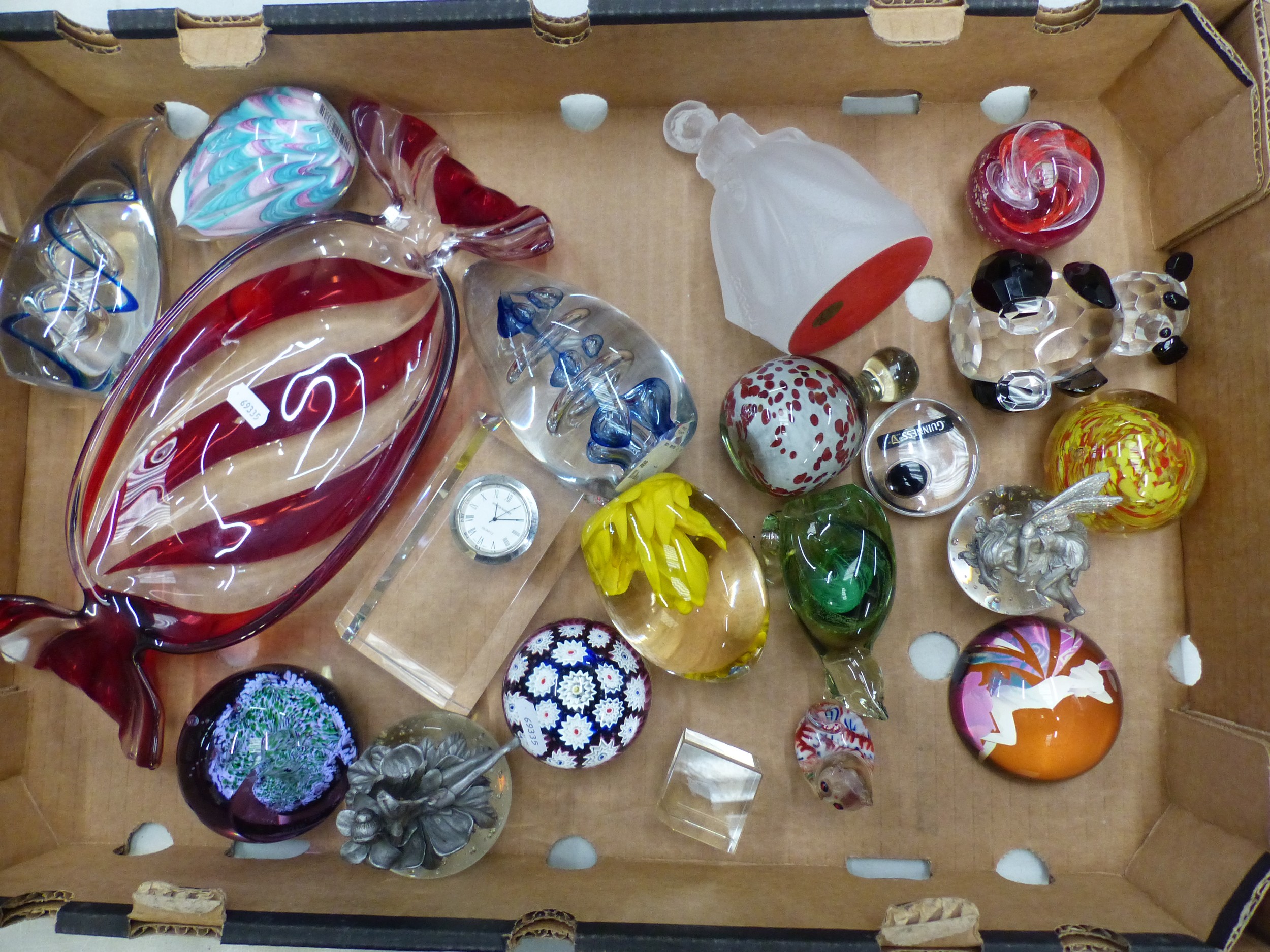 A collection of glass paperweights, crystal figures, etc, including a ...