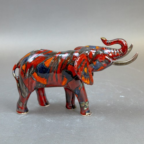 15 - Anita Harris, stunning model of an Elephant with reactive glazes H13cm x L21cm. Gold signed.