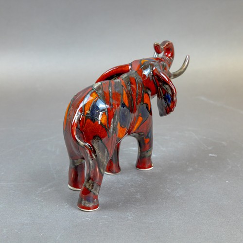 15 - Anita Harris, stunning model of an Elephant with reactive glazes H13cm x L21cm. Gold signed.