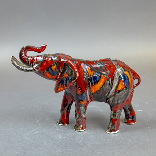 15 - Anita Harris, stunning model of an Elephant with reactive glazes H13cm x L21cm. Gold signed.