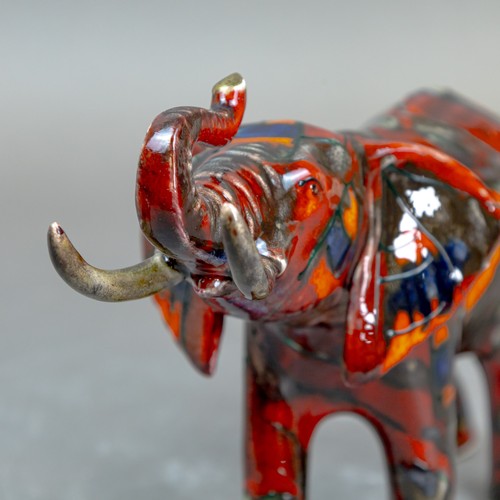 15 - Anita Harris, stunning model of an Elephant with reactive glazes H13cm x L21cm. Gold signed.