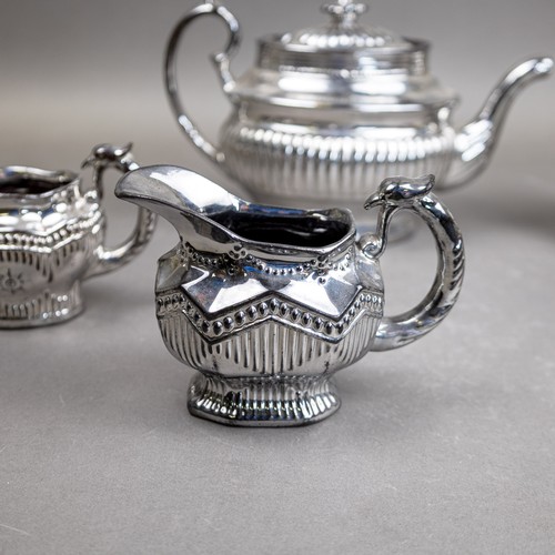 31 - Late 19th/early 20th century ceramic chrome Lustre glaze tea pot, covered hexagonal, fluted sugar bo... 