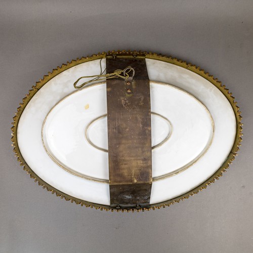 36 - A large oval dish ornately decorated in the manner of Sevres porcelain, featuring a male and three f... 