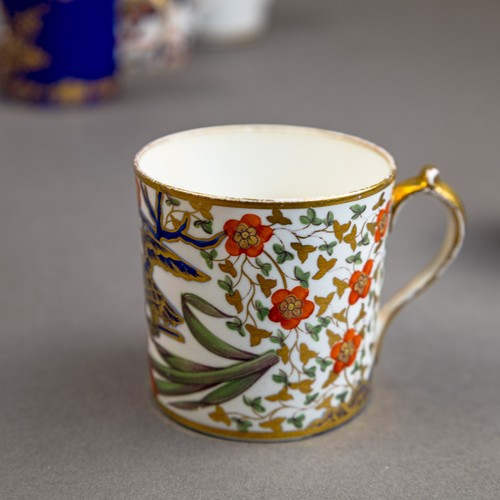 44 - A collection of 18th and 19th century porcelain coffee cans in various patterns from different manuf... 