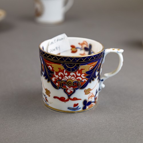 44 - A collection of 18th and 19th century porcelain coffee cans in various patterns from different manuf... 