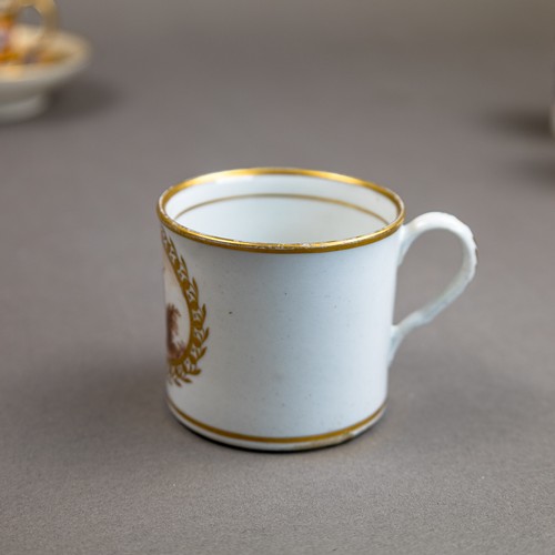 44 - A collection of 18th and 19th century porcelain coffee cans in various patterns from different manuf... 