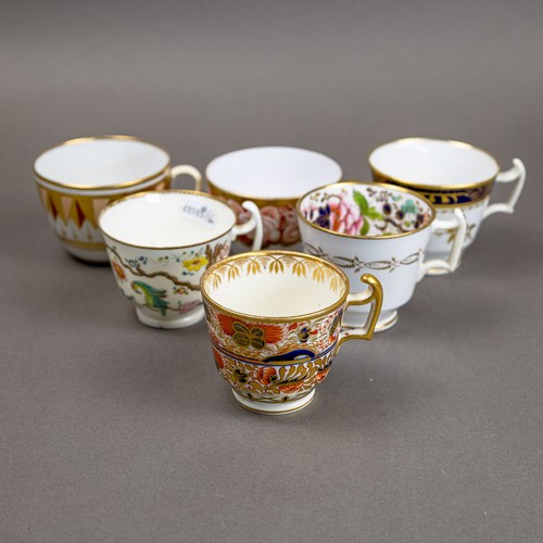 57 - A collection of 19th century porcelain tea cups in various patterns from different manufacturers, de... 