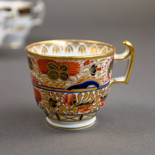 57 - A collection of 19th century porcelain tea cups in various patterns from different manufacturers, de... 