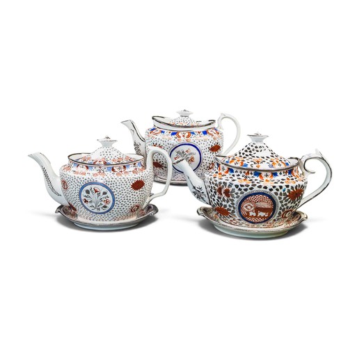 A group of 3 English porcelain 19th century teapots with stands, all ...