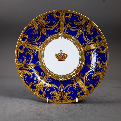 An early 20th century Sevres plate, ornately decorated with a gilded ...