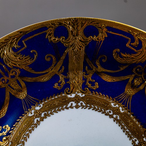 An early 20th century Sevres plate, ornately decorated with a gilded ...