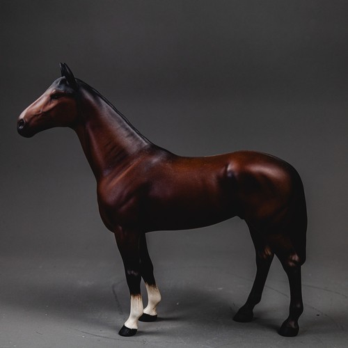 Two Beswick brown matt horses, 'The Winner' and '818 Shire'. Model nos ...