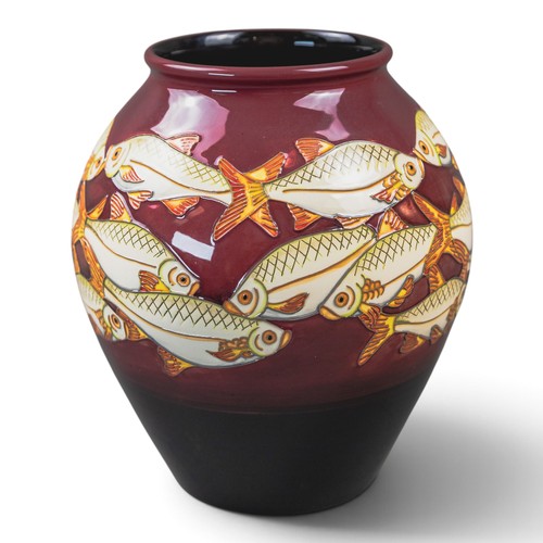 A Moorcroft limited edition fish design vase designed by Helen Dale ...