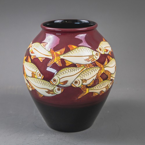 A Moorcroft limited edition fish design vase designed by Helen Dale ...