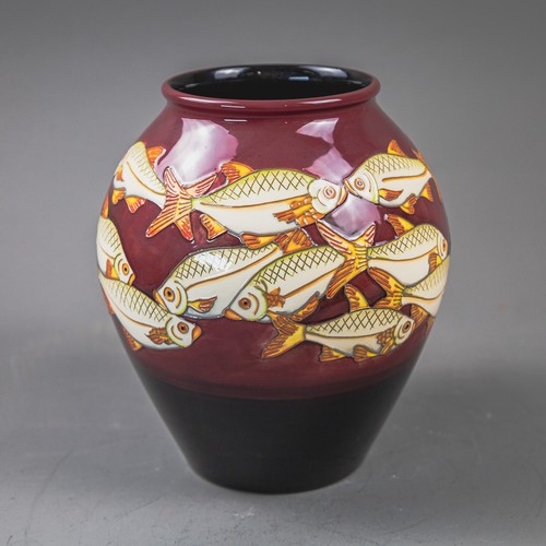 A Moorcroft limited edition fish design vase designed by Helen Dale ...