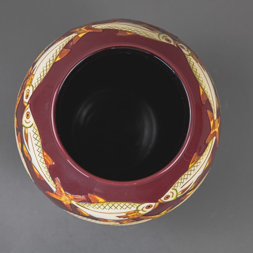 A Moorcroft limited edition fish design vase designed by Helen Dale ...