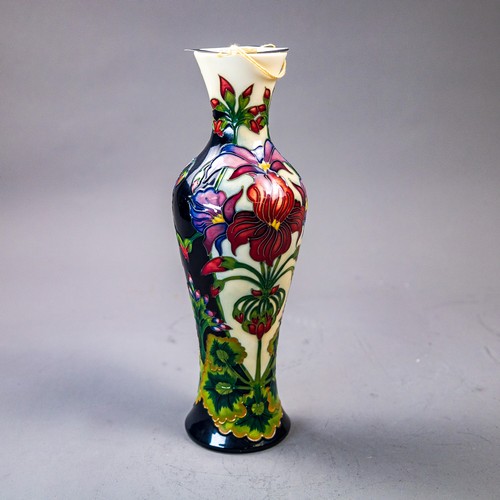 A Moorcroft limited edition vase in the Pelargonium design, by Philip ...
