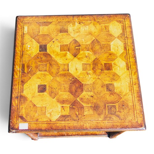 A vintage two-tier square table, featuring geometric patterns & turned ...