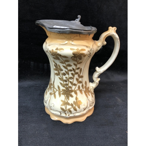 100 - Victorian pewter lidded jug 20cm high