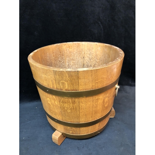 118 - Oak, copper bound barrel planter 36cm diameter X 35cm high