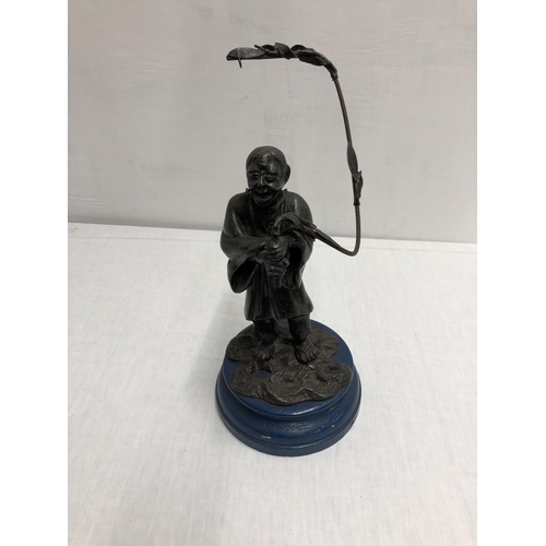 138 - Bronze figurine 27cm high