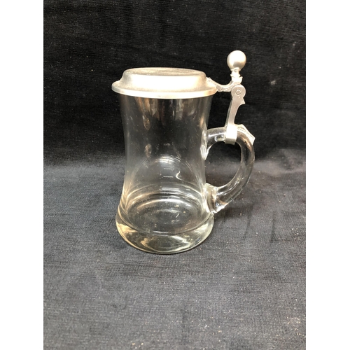 140 - Glass decanter with pewter lid 16cm high