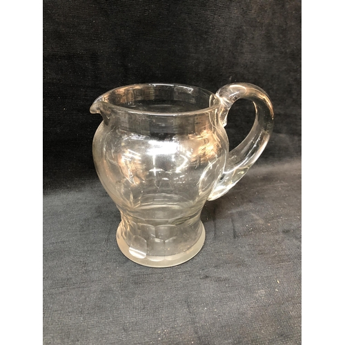 142 - Glass jug 19cm high