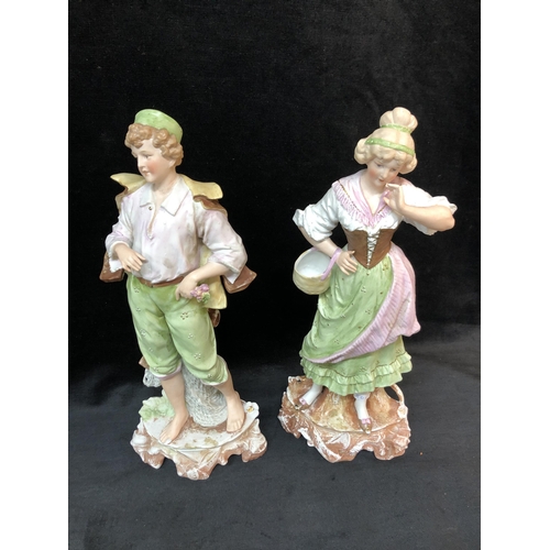 164 - Pair of German bisque ware figurines 45cm high