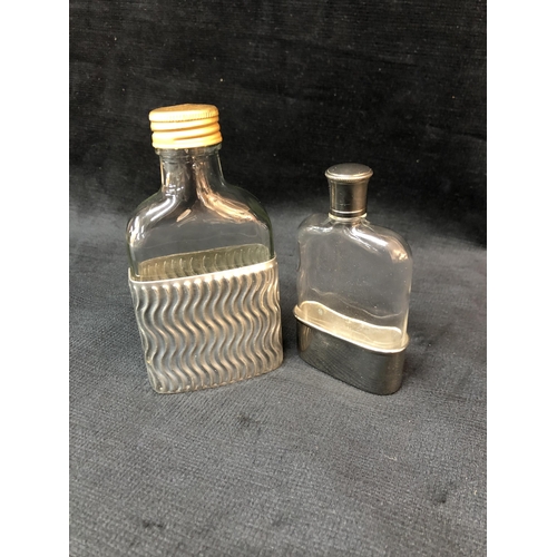 196 - Two hip flasks. Tallest 13cm