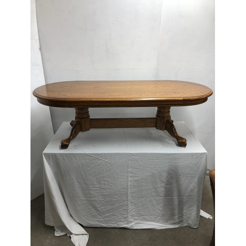 232 - Oval Oak coffee table 137cm with some marks on surface