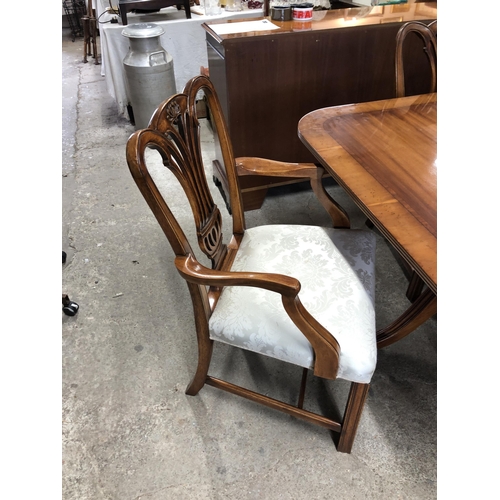 238 - Wade inlaid dining table on twin pedestals with two extra leaves. 290cm fully extended with six maho... 