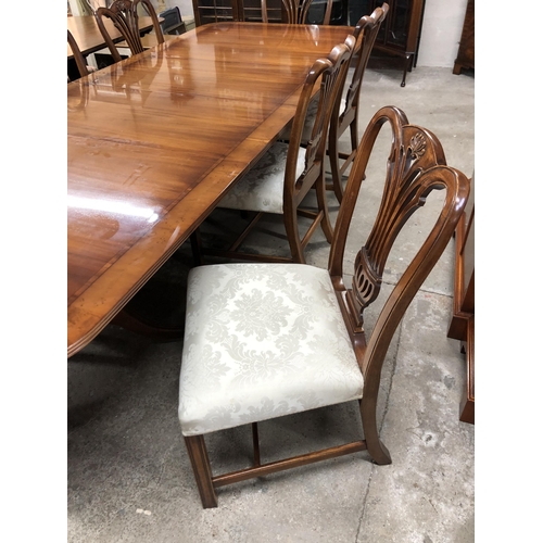 238 - Wade inlaid dining table on twin pedestals with two extra leaves. 290cm fully extended with six maho... 