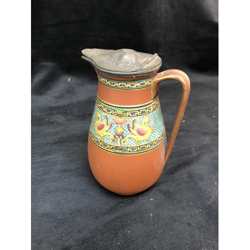 55 - Victorian pottery jug with pewter lid 20cm high