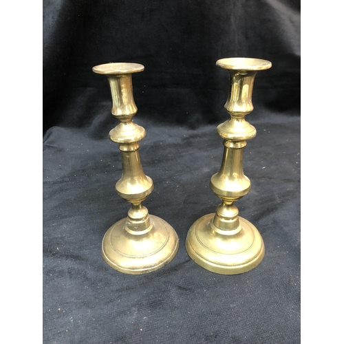 57 - Pair of Victorian brass candlesticks 25cm high