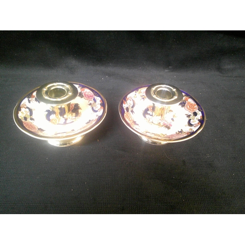 106 - Two Mason's pottery candle holders