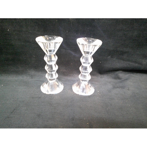 113 - Pair of glass candlesticks 16cm high