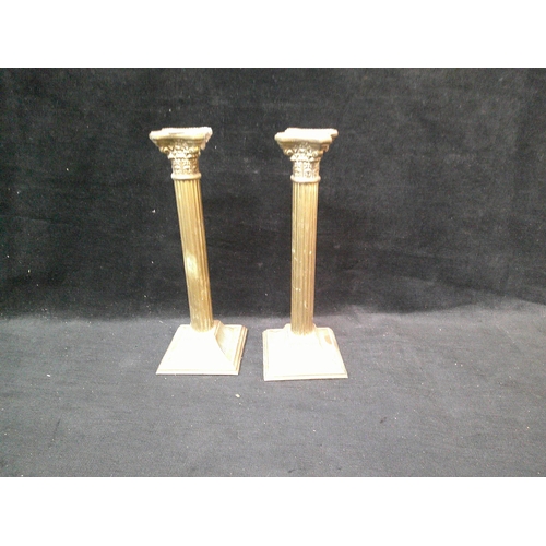 3 - Pair of brass candlesticks 25cm high