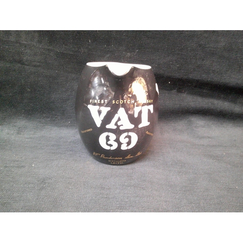 63 - Vat 19 pub jug 14cm high