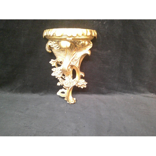 9 - Gold coloured wall shelf 47cm high