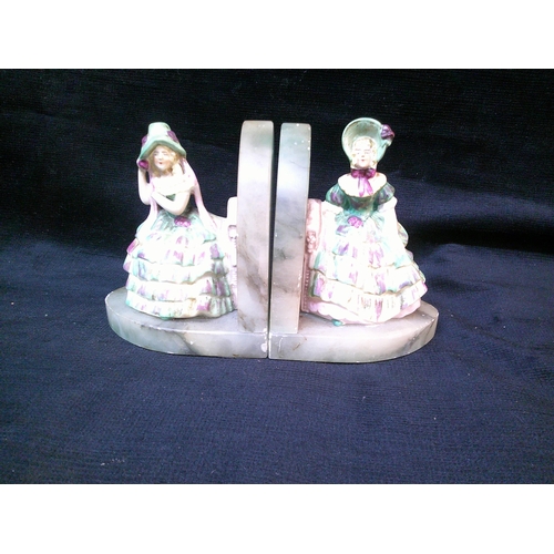 92 - Pair of marble & figurine bookends