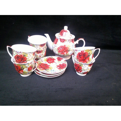 104 - Tara pottery teapot, six cups & three saucers