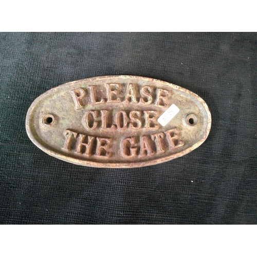 50 - Small oval iron sign 19cm X 10cm