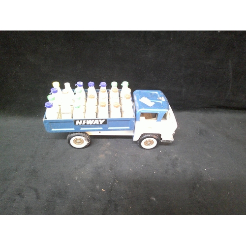 12 - Model tinplate milk float 32cm