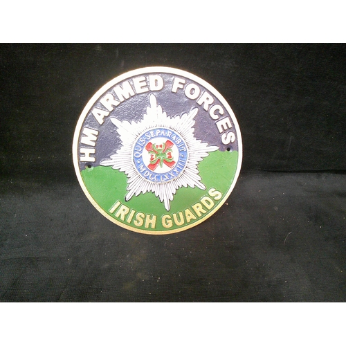 31 - Circular iron Irish Guards plaque 24cmD