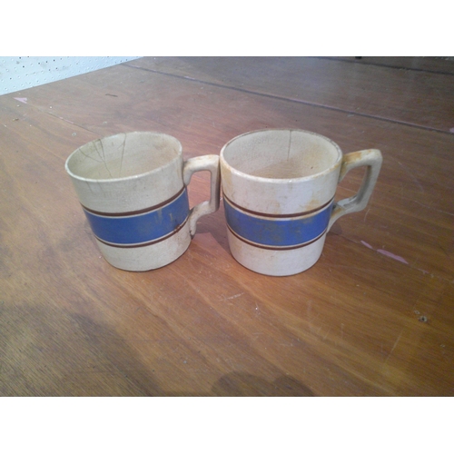 53 - Two Victorian pottery mugs